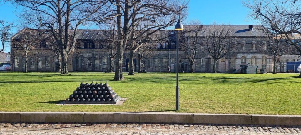 Kuglegårdsvej navy courtyard in Copenhagen with stacked historic cannonballs