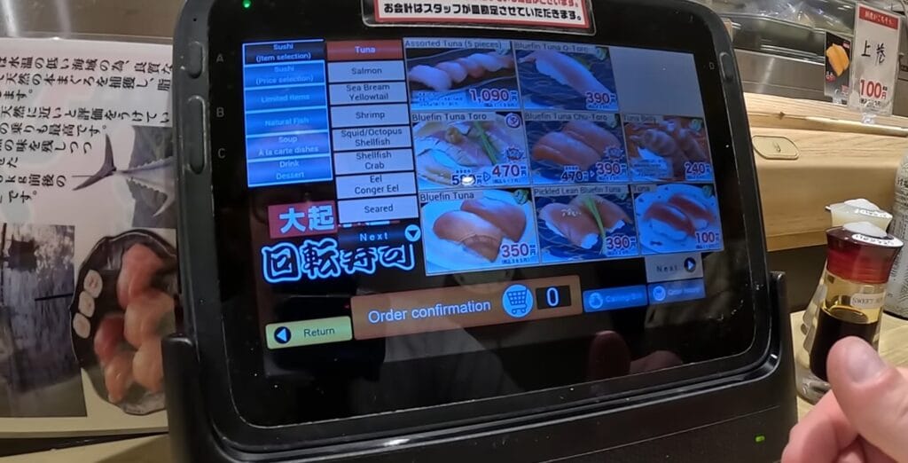 Touchscreen ordering system at Daiki Suisan conveyor belt sushi in Kyoto Tower Sando food hall