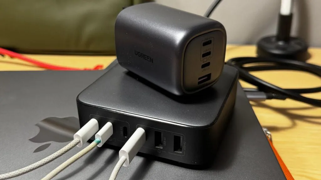 UGREEN multi‑port GaN charger with smaller GaN wall charger placed on top