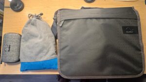 CPAP airline policy: ResMed AirMini case, drawstring bag and ResMed AirSense 10 travel bag packed as carry-on