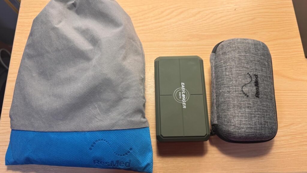 ResMed AirMini hard case, Easylonger ES270 battery and ResMed drawstring bag, the kit I actually travel with